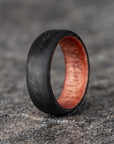 Matte Round Top Carbon Fiber Unidirectional Ring with Sedona Red Wood Core