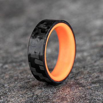 Matte Carbon Fiber Horizontal Pattern Ring with Orange Glow Resin