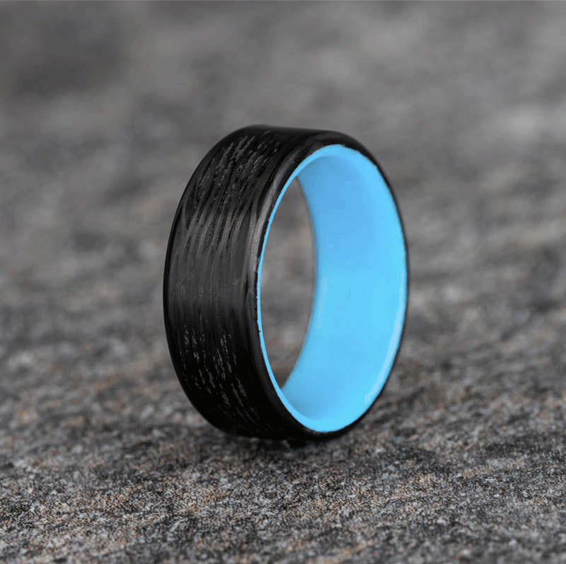 Polished Carbon Fiber Wave Pattern Ring with Pale Blue Glow Resin