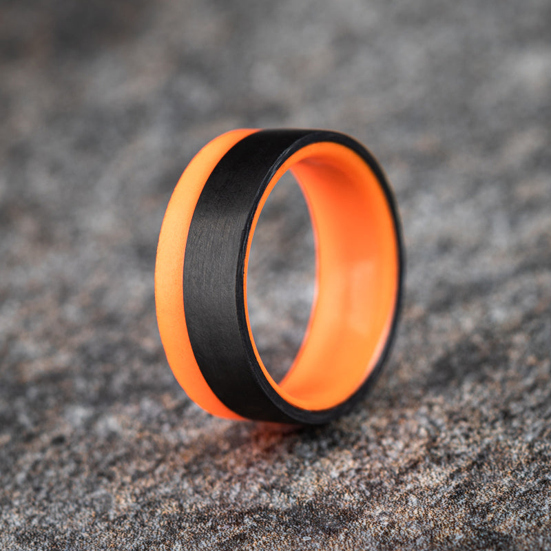 Polished 2/3 Carbon Fiber Unidirectional Ring with Orange Glow Resin