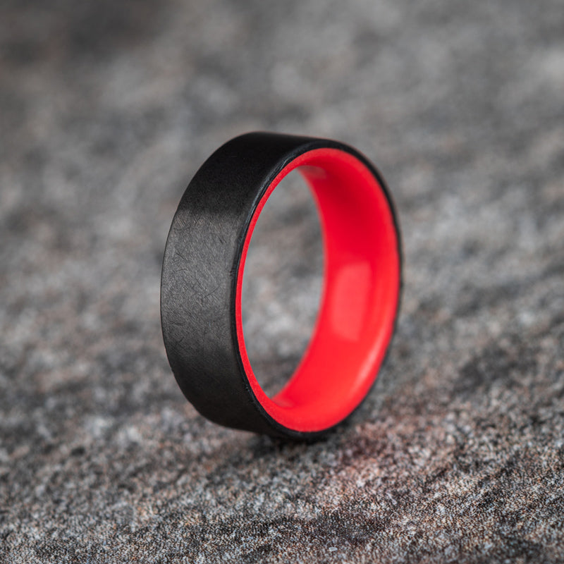 Matte Carbon Fiber Unidirectional Ring with Red Glow Resin