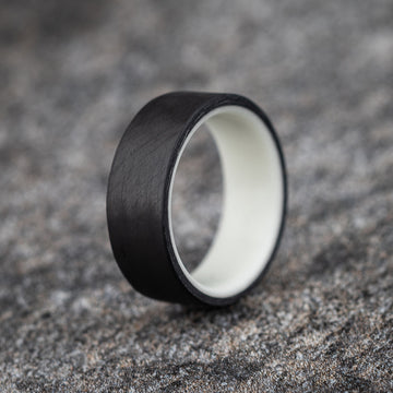 Matte Carbon Fiber Unidirectional Ring with White Glow Resin